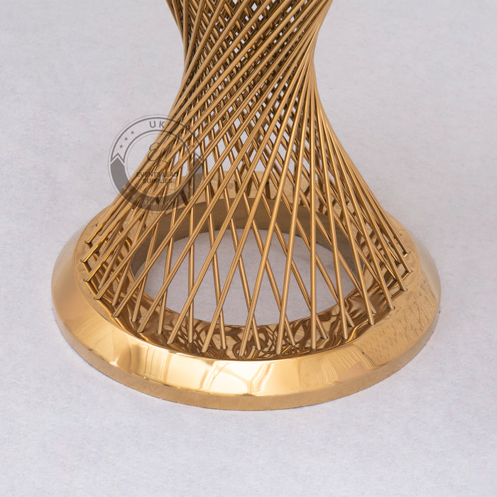 wedding cake table with twisted gold rods