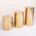 gold cyclinder Plinths