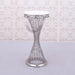 set of three silver stands 