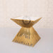 wedding cake table in gold 